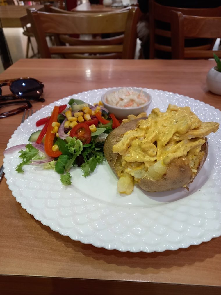 Jacket potato with cheese and salad